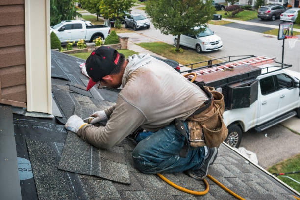 Professional Roof Replacement technician working in Trimble, MO